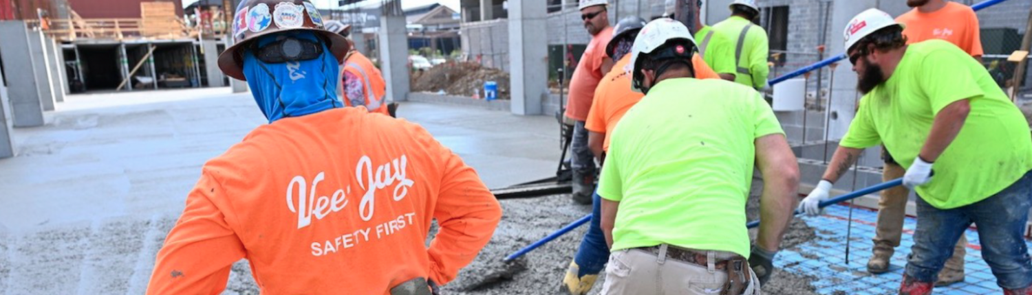 Vee-Jay cement crew finishing concrete